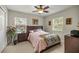 Comfortable bedroom with natural light and neutral carpeting at 4966 Sw 107Th Loop, Ocala, FL 34476