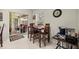 Cozy breakfast nook with a table, chairs, and a view of the outdoor patio, perfect for casual dining at 4966 Sw 107Th Loop, Ocala, FL 34476