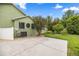 Private patio area with neutral tones, a satellite dish and a round window at 4966 Sw 107Th Loop, Ocala, FL 34476