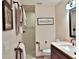 Cozy bathroom features a tiled shower, modern fixtures, and neutral decor at 7939 Se 12Th Cir, Ocala, FL 34480