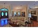 Comfortable living room with plush sofa, hardwood floors, and stylish decor at 7939 Se 12Th Cir, Ocala, FL 34480