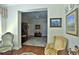 Warm living room with wooden floors, unique decor, and comfortable seating at 7939 Se 12Th Cir, Ocala, FL 34480
