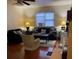 Inviting living room featuring comfortable seating and natural light at 10805 Se 102Nd Pl, Ocala, FL 34472