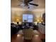 Comfortable living room featuring classic furnishings and ample lighting at 10805 Se 102Nd Pl, Ocala, FL 34472