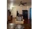 Cozy living space boasting hardwood floors and a relaxed atmosphere at 10805 Se 102Nd Pl, Ocala, FL 34472