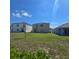 Expansive backyard providing a serene outdoor space, perfect for relaxation and recreation at 1114 Brimstone Cir, Winter Haven, FL 33884