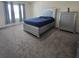 Spacious bedroom featuring stylish furnishings, including a unique bed frame and matching dressers at 1114 Brimstone Cir, Winter Haven, FL 33884