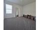 Empty bedroom with neutral carpet, ready for personalization and comfort at 1114 Brimstone Cir, Winter Haven, FL 33884