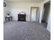Bright bonus room showcases modern fireplace and large mirror adding depth to the space at 1114 Brimstone Cir, Winter Haven, FL 33884