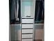 Efficiently designed closet with hanging space and storage drawers for organization at 1114 Brimstone Cir, Winter Haven, FL 33884