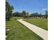 Well-maintained community area with a pathway, gazebo, and benches, perfect for socializing and relaxation at 1114 Brimstone Cir, Winter Haven, FL 33884