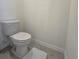 Clean and simple toilet and tile flooring, offering a functional space at 1114 Brimstone Cir, Winter Haven, FL 33884