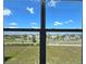 Scenic view from the home overlooking well-maintained lawns and neighboring houses at 1114 Brimstone Cir, Winter Haven, FL 33884