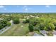 Aerial view of the neighborhood and the surrounding woods at 11569 Sw 75Th Cir, Ocala, FL 34476