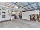 Spacious garage with organized storage and ample workspace for projects at 11569 Sw 75Th Cir, Ocala, FL 34476