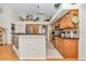 Spacious kitchen showcasing wood cabinetry, stainless appliances, granite countertops, and stylish decor at 11569 Sw 75Th Cir, Ocala, FL 34476