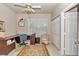 Comfortable office with an expansive desk space, woven chair, and a large closet at 11569 Sw 75Th Cir, Ocala, FL 34476