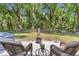 Cozy patio area with comfortable seating and outdoor decor for relaxing at 11569 Sw 75Th Cir, Ocala, FL 34476