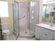 Bathroom featuring a glass door shower and toilet at 11628 Sw 140Th Loop, Dunnellon, FL 34432