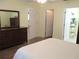 Bedroom showing closet and bathroom entrances at 11628 Sw 140Th Loop, Dunnellon, FL 34432