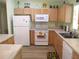 Well-equipped kitchen with updated appliances, plenty of counter space, and warm, inviting decor at 11628 Sw 140Th Loop, Dunnellon, FL 34432