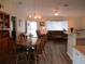 Inviting living room with a dining area, neutral decor, and lots of natural light at 11628 Sw 140Th Loop, Dunnellon, FL 34432