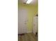 Mud Room features a white cabinet and door to the exterior at 11628 Sw 140Th Loop, Dunnellon, FL 34432