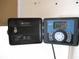 Open sprinkler control box showing off, clear, and auto buttons at 11628 Sw 140Th Loop, Dunnellon, FL 34432