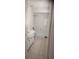 Clean bathroom with shower and tub combo and vanity with sink, offering a relaxing space at 12 Brook Pl, Ocala, FL 34472