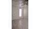 Inviting bedroom featuring tile floors, a ceiling fan, and natural light from a window at 12 Brook Pl, Ocala, FL 34472