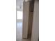 Bedroom with tile floors and open closet space at 12 Brook Pl, Ocala, FL 34472
