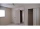 Bedroom with tile floors and closet space at 12 Brook Pl, Ocala, FL 34472