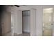 Main bedroom with closet and bathroom entrance, offering privacy and convenience at 12 Brook Pl, Ocala, FL 34472