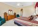 Main bedroom with furnishings and natural light at 12255 Se 177Th Loop, Summerfield, FL 34491
