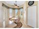 Bright breakfast nook with large windows and comfortable seating. Great natural light! at 12255 Se 177Th Loop, Summerfield, FL 34491