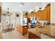 Bright kitchen with granite countertops, stainless steel appliances, and breakfast nook at 12255 Se 177Th Loop, Summerfield, FL 34491