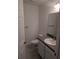 Clean bathroom with modern fixtures, a vanity, and a toilet at 15 Juniper Trail Crse, Ocala, FL 34480
