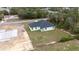Exterior shot of the modern home with a well-manicured lawn at 16890 Sw 39Th Cir, Ocala, FL 34473