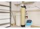 Garage details feature a water filtration system and organization, adding convenience and value at 17902 Se 115Th Cir, Summerfield, FL 34491