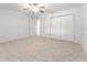 Spacious bedroom featuring neutral walls and floors and large closet at 19938 Burkitt Rd, Dunnellon, FL 34432
