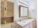 Bathroom featuring a vanity with a white sink and a wooden cabinet at 258 Nw 122Nd Ave, Oxford, FL 34484