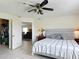 Bedroom with a bed, ceiling fan, and closet at 258 Nw 122Nd Ave, Oxford, FL 34484