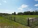 Fenced pasture with gated entry at 258 Nw 122Nd Ave, Oxford, FL 34484