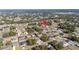 An aerial view of a neighborhood showcasing single-Gathering homes and lush greenery at 2627 Sw 154Th Place Rd, Ocala, FL 34473