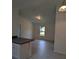 Bright and airy living room with hardwood floors and a large window at 267 Oak Lane Trak, Ocala, FL 34472