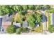 An aerial view showing a home with mature trees and surrounding neighborhood streets at 426 Sw 13Th St, Ocala, FL 34471