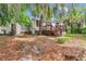 The exterior has a backyard with a deck and patio at 426 Sw 13Th St, Ocala, FL 34471