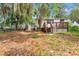The exterior has a backyard with a deck at 426 Sw 13Th St, Ocala, FL 34471
