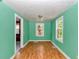 The bedroom is bright with wood laminate flooring, and two windows at 426 Sw 13Th St, Ocala, FL 34471