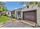 Charming single-story home featuring a well-kept lawn and attached garage, offering a cozy suburban living experience at 426 Sw 13Th St, Ocala, FL 34471